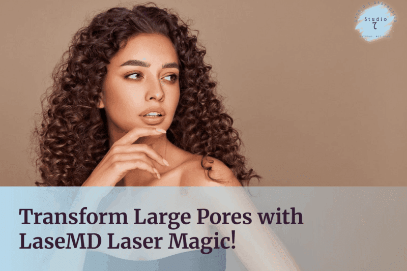 Woman with curly hair touching her face.